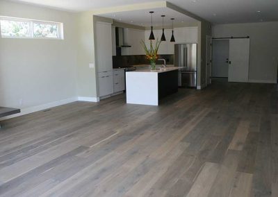 LoneWolf Homes Rayburn living room looking to kitchen